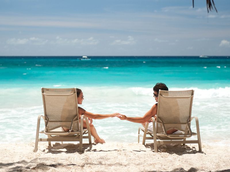Couple lounging on the beach