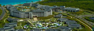 Aerial view of resort with the ocean in the background