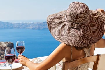 Drinking wine in Santorini