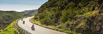 Enjoy stunning mountain views with Eagle Rider Motorcyle Tours