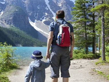 Father and son hiking at Lake Louise