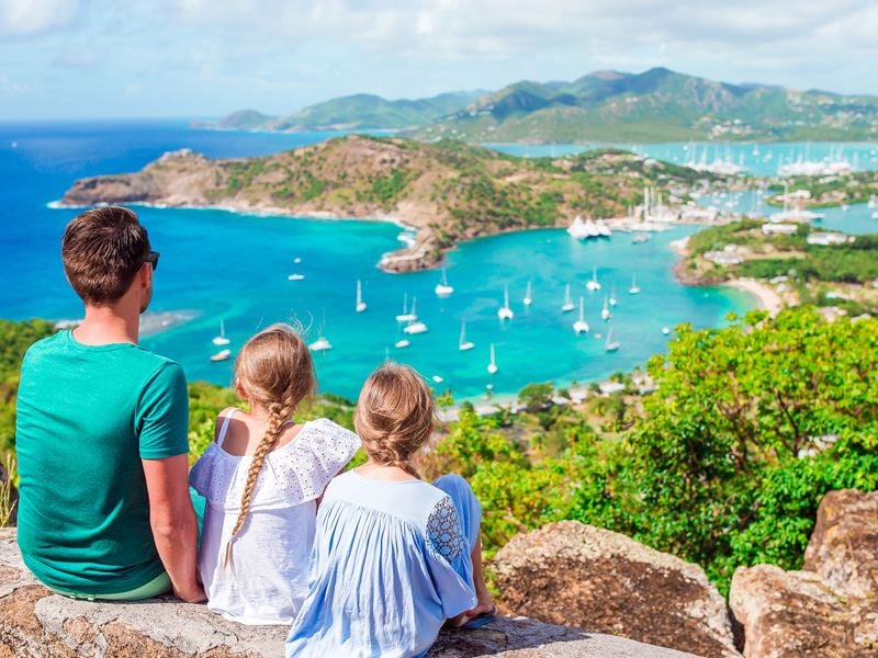 family looking over antigua bay