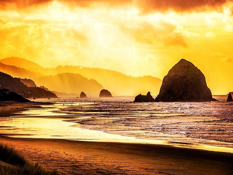 Fiery sunset over Haystack Rock, Cannon Beach