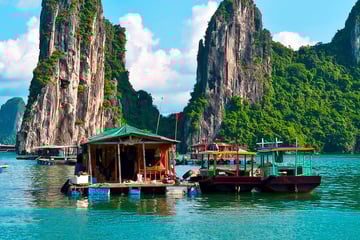Floating village by Rock Islands, Halong Bay