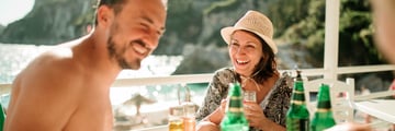 Friends enjoying drinks in Corfu, Greece
