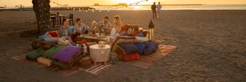 Picnicking on the beach with friends in Ras Al Khaimah