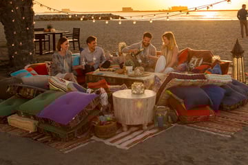 Picnicking on the beach with friends in Ras Al Khaimah