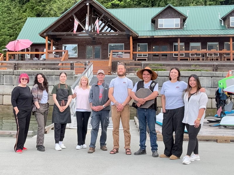 thew crew all posing together at Klahoose Wilderness Resort