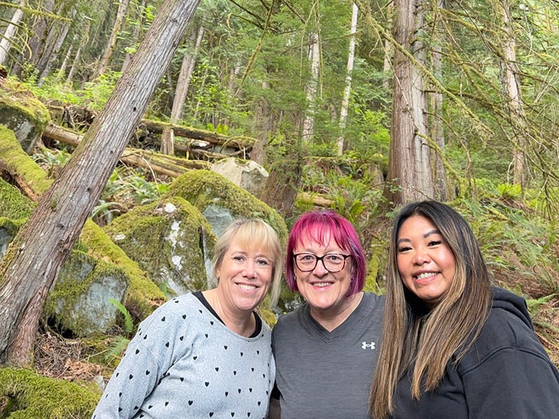 kathryn, lisa and anna in the forest at klahoose wilderness resort