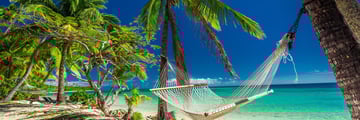 A secluded hammock on the beach in Fiji