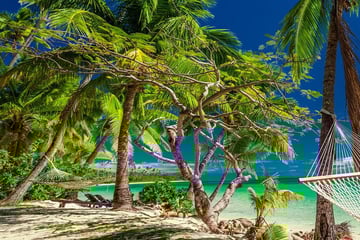 A secluded hammock on the beach in Fiji
