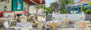 Bar La Pergola and Terrace Main Restaurant at Hotel Colon Guanahani