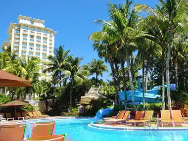 The hotel's pool features a 140 ft waterslide