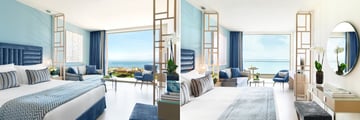 Junior Suite with Private Garden and Panorama Junior Suite at Ikos Oceania