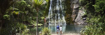 Exploring Karekare Waterfall in Auckland together