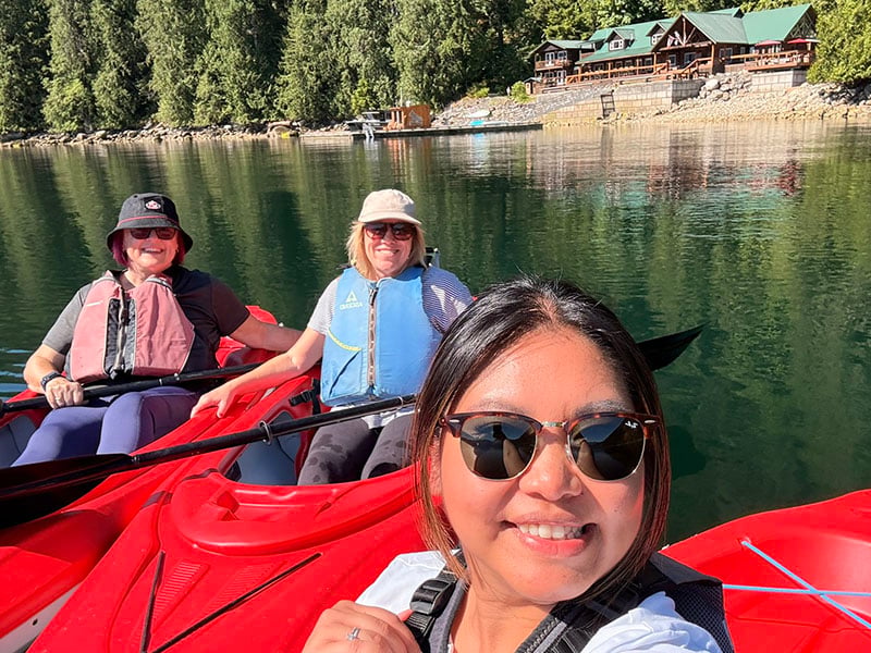 lisa, kathryn and anna kayaking at klahoose wilderness resort