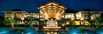 Kempinski Seychelles Resort Baie Lazare, Lobby and Resort Pool at Night