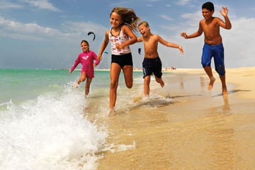 Kids playing on the beach