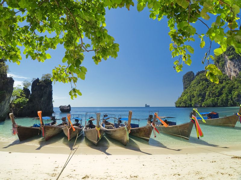 Longtail boats at the beach in Krabi