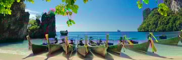 Longtail boats on Krabi beach