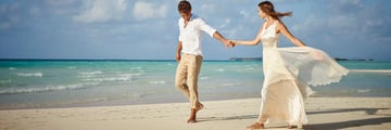 Happy married couple at LUX* South Ari Atoll