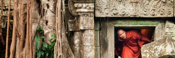 Monk exploring Angkor Wat