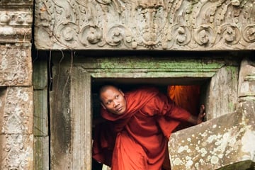 Monk exploring Angkor Wat
