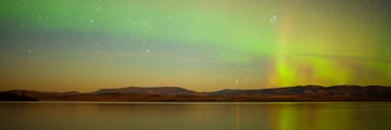 Northern Lights mirroring Lake Laberge, Yukon