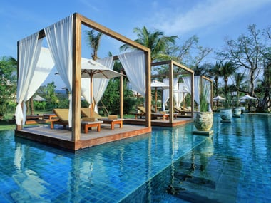 Pool lounge areas at The Sarojin