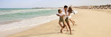 Family on the beach at Ras Al Khaimah