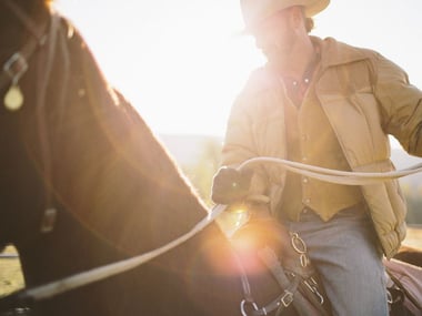 Riding horseback on a ranching holiday