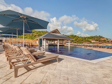 The main pool and loungers at Royalton Antigua