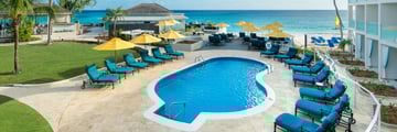 Sea Breeze Beach House, Pool and Beach View