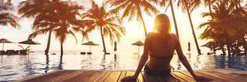 Single woman enjoying the sunset