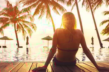 Single woman enjoying the sunset