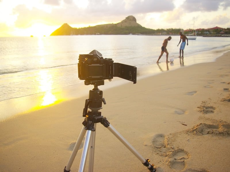 Ben Howell captures a couple of guys playing football on a beach in St Lucia at sunset