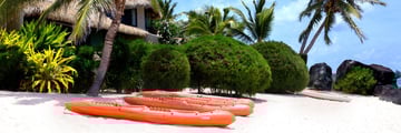 Kayaks on the Beach at Te Manava Luxury Villas & Spa