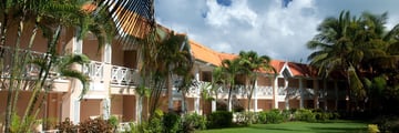 Coco Reef Resort gardens and exterior