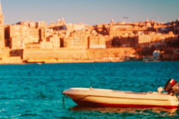Traveller overlooking Valletta, Malta