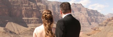 Happy wedding couple enjoying the views of Grand Canyon