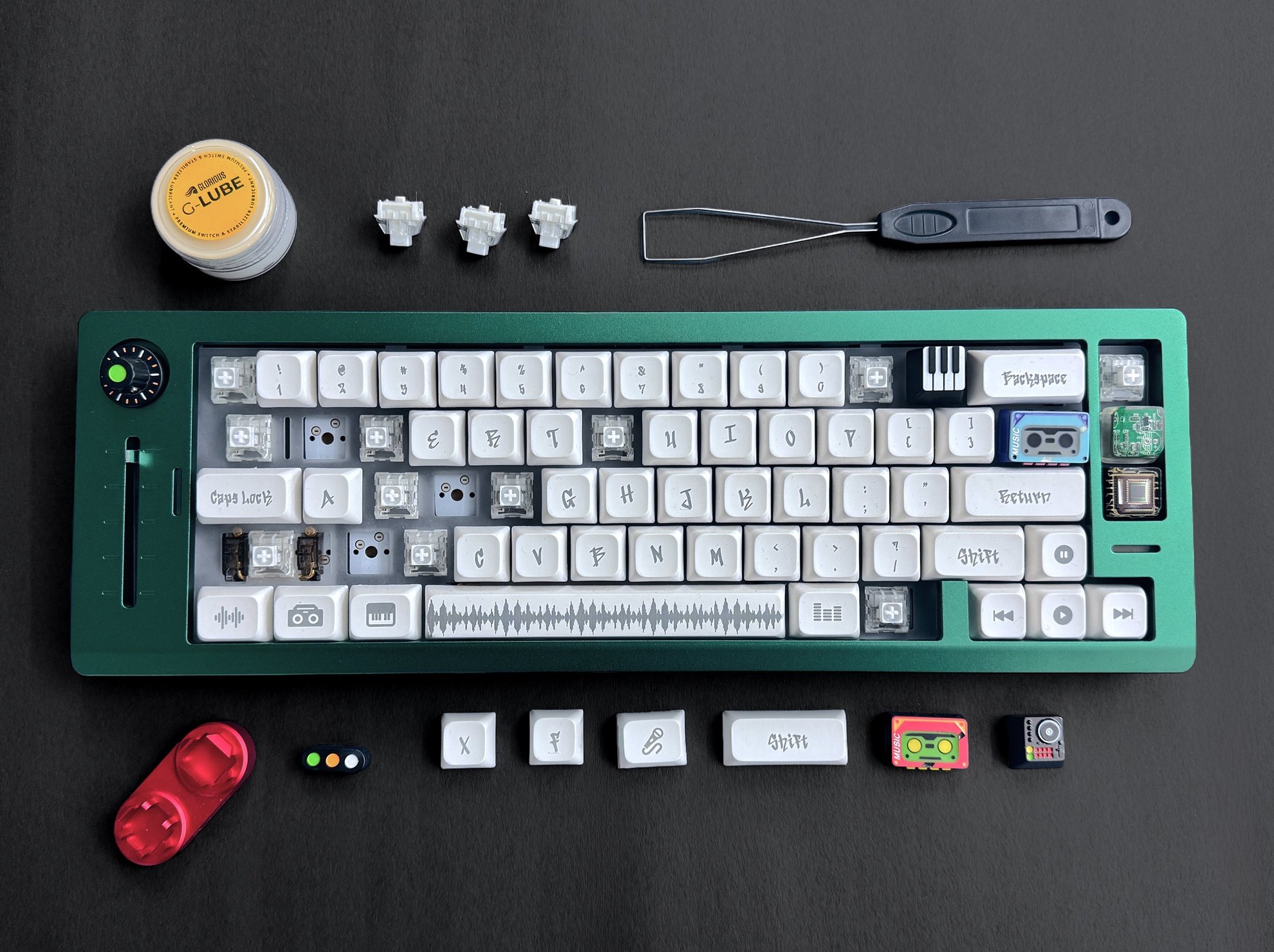 A custom keyboard seen from directly above, with its keycaps and built-in controls.