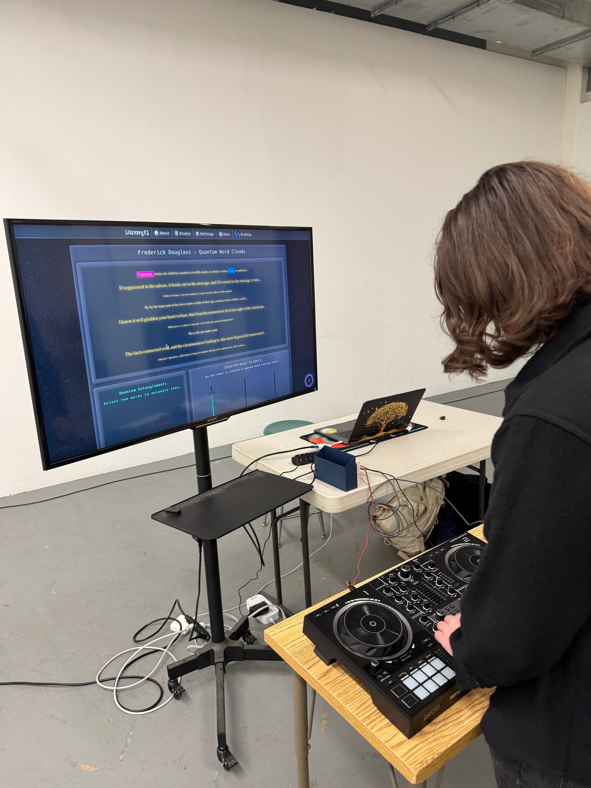 A visitor playing Quantum Word Clouds with the DJ controller