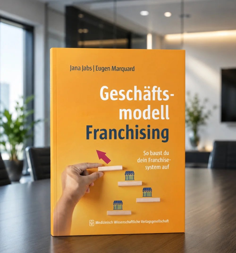 Buch „Geschäftsmodell Franchising – So baust Du Dein Franchisesystem auf“ von Jana Jabs und Eugen Marquard.