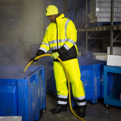 Worker in High-visibility RefrigiWear Workwear