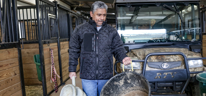 A man wearing 1 of RefrigiWear's All-Weather Jackets at Work