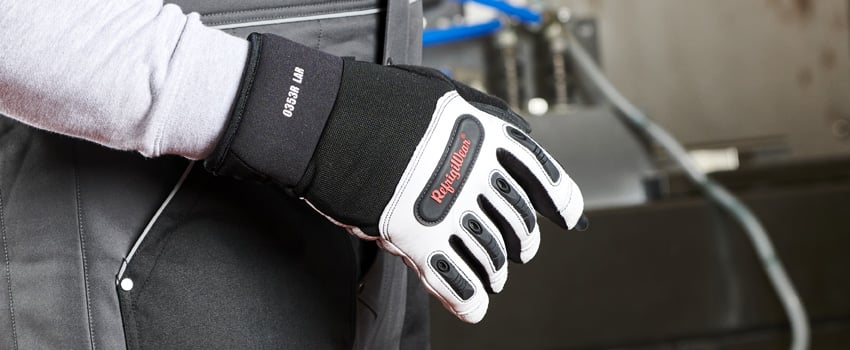 Person wearing Key-Rite insulated glove works in a refrigerated warehouse.