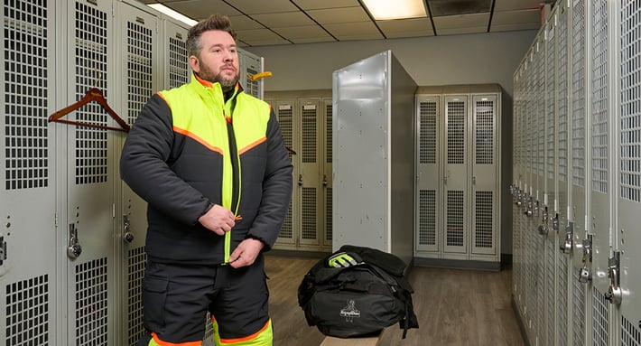 Man putting on FrostFlex System in locker room