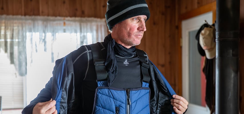 Man wearing RefrigiWear working outdoors in Refrigiwear base layers.