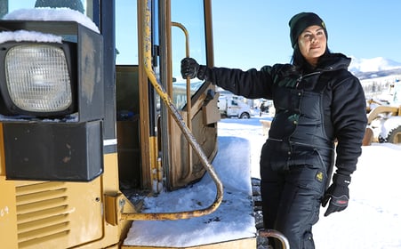 Woman in Refrigiwear working at a jobsite.