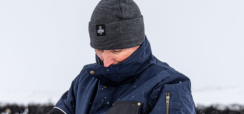 Man wearing RefrigiWear working outdoors in Refrigiwear base layers.